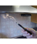 Smoke Pen Kit With 3 Smoke Sticks For Leak Testing And Airflow Studies, in use under range hood showing smoke trail.