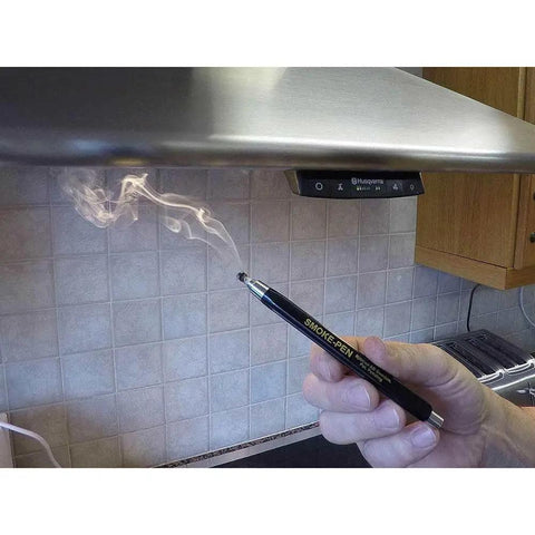 Smoke Pen Kit With 3 Smoke Sticks For Leak Testing And Airflow Studies, in use under range hood showing smoke trail.