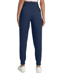 Back view of navy blue fleece lined womens joggers with zip pockets high waist athletic pants for travel lounge and workout plus size 3XL.