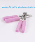 Close-up of pink diamond sharpening stones from 32 Pcs Diamond Chainsaw Sharpener Kit with 5.5 mm grinding heads, showing various sizes.