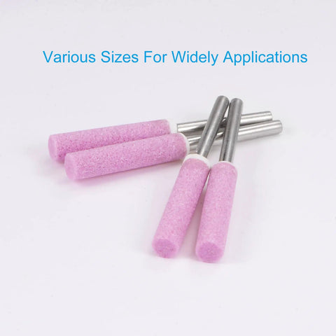 Close-up of pink diamond sharpening stones from 32 Pcs Diamond Chainsaw Sharpener Kit with 5.5 mm grinding heads, showing various sizes.