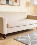 Six Inch Round Wood Sofa Legs Espresso Eucalyptus Finish Replacement Feet Set Of Four On Beige Sofa In Living Room