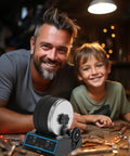 Father and son smiling near Pro Grade Rock Tumbler Kit With 3.5Lb Capacity, digital timer visible, lit workshop background.