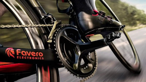 Assioma Duo Upgraded Double Sided Power Meter Pedals Waterproof With Extra Cleats Bundle Including cyclist pedaling on road bike