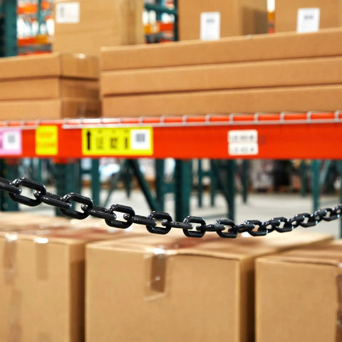 Close-up of Heavy Duty Black Plastic Chain Links 100 Ft For Safety Barriers On Fences, Driveways, Parking Lots And Gates in warehouse
