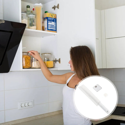 Upgrade Your Cupboards With These Durable White Plastic Rebounders For Easy Push To Open, Perfect Cabinet Door Catches shown in use.