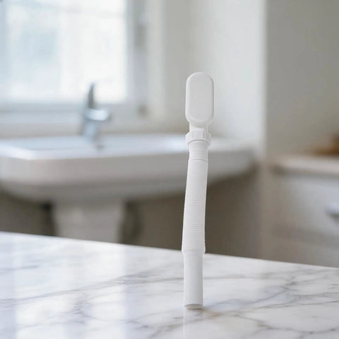 G1-1/2 Flat Bathtub Drain Pipe Kit Flexible Waste Pipe for Freestanding Tub Low Profile P-Trap White 92cm on marble surface.