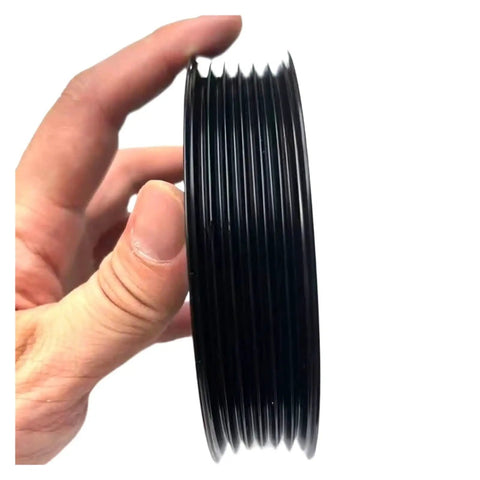Smooth Drive Serpentine Idler Pulley That Fits Subaru Cars Perfect To Stop Belt Slippage, shown from the side, features a durable black finish.