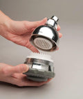 Hands assembling Wall Mounted Water Filtered Shower Head with Massage in Chrome Finish Reduces Chlorine and Sulfur Odor Softens Skin