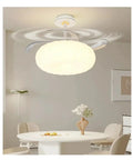 Modern Luxury Chandelier Ceiling Fan Combo With Remote Control For Living Room Nordic Style Lighting Fixture hanging above a white dining table.