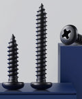 Number Eight By Three Quarters Inch Self Tapping Pan Head Wood Screws With Phillips Drive And Black Oxide Finish For Sturdy Timber And Thin Metal Projects Built Hella Tough With Zero Rust Drama Included displayed in three sizes on a blue surface.