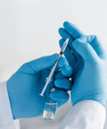 1 Ml Syringe With 31G Five Sixteenth Inch Needle Pack Of 30 Individually Wrapped Lab Tools For Quick Readouts And A Smooth Plunger Clear Scale And Airtight Inner Wall Perfect For Lab Work Medical Demos Or At Home Experiments. gloved hands holding 1 mL syringe with clear scale
