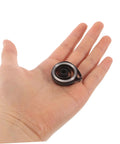 Person holding Complete Mechanical Alarm Clock Repair Kit With Spring Steel Return Spring Assembly in hand