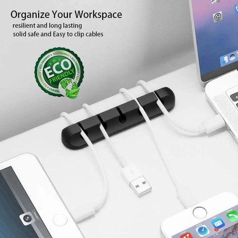 Self Adhesive Cable Clip Organizer Set For Desk, Car, Nightstand And Office Silicone Cord Holders With 7 5 3 1 1 Slots, Grab-And-Go Wire Clips For Phone Chargers, Black visible in action on a desk.