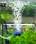 Food-grade silicone tubing 1/4 in ID x 3/8 in OD, blue inline aerator installed in an aquarium releasing bubbles