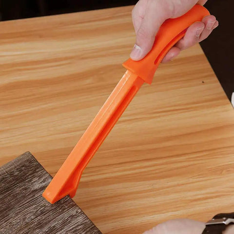 Person using one of Four Pack Table Saw Push Sticks With Pro Grade Ergonomic Handles For Safe Woodworking on a wooden board.