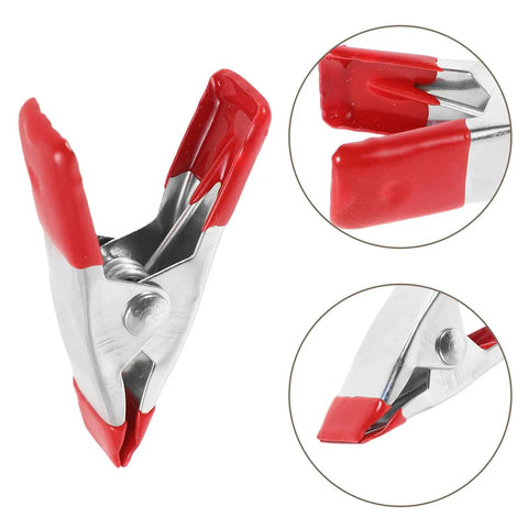 Super Sturdy 12 Piece Heavy Duty Metal Spring Clamps With Red Coated Jaws, Perfect For Woodworking Crafts Panel Fixing And DIY Household Projects That Rock. Metal spring clamp with red coated jaws for woodworking and DIY.