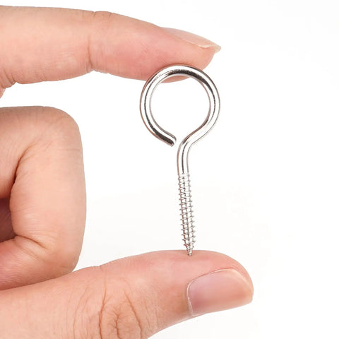 Heavy Duty 304 Stainless Steel Eye Screws 30 Pack Slick Corrosion Proof Screw Hooks for DIY Crafts, held between fingers.