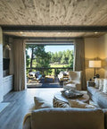 No Brainer Walnut Aging Wood Stain In 5 Gallon Pails used on rough cut lumber in a modern rustic interior with a fireplace.