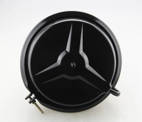Brake booster front view, round black disc with three-spoke hub design and mounting bolts visible