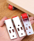 Top Shelf Set Of Four Stainless Steel Cabinet Door Rollers Paired With Heavy Duty Galvanized Track And Durable Plastic Gliders For Smooth As Butter Bottom Casters in hand.