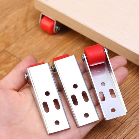 Top Shelf Set Of Four Stainless Steel Cabinet Door Rollers Paired With Heavy Duty Galvanized Track And Durable Plastic Gliders For Smooth As Butter Bottom Casters in hand.