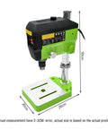 Hot Power 680W Mini Workbench Drill Press Machine For Wood Metal And Plastic on a sturdy green base with a 20cm x 26cm platform.
