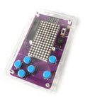 Noob Friendly Soldering Practice Kit For DIY Electronics Projects Learn To Solder With Detailed Circuit Schematics And Hands On STEM Education For Starters, showing a translucent kit with buttons and LED display.