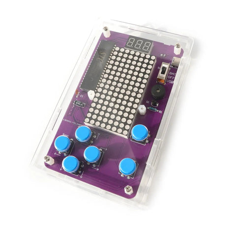Noob Friendly Soldering Practice Kit For DIY Electronics Projects Learn To Solder With Detailed Circuit Schematics And Hands On STEM Education For Starters, showing a translucent kit with buttons and LED display.