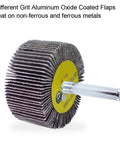 Close-up of a Flap Wheels Set Of Twelve, Two Inch By One Inch By Quarter Inch, Aluminum Oxide, Pro Grade For Rust Removal And Weld Burrs, Three Of Each Grit Forty Sixty Eighty One Twenty, Quarter Inch Shank Fits All Drills.