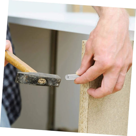Installation of a stainless steel dowel pin in wood, part of Stainless Steel Dowel Pins Set Of 100 Pro Grade Precision Positioning.