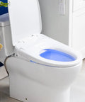 Top Shelf Elongated Bidet Toilet Seat Crisp White with LED nightlight and adjustable nozzle in modern bathroom setting.