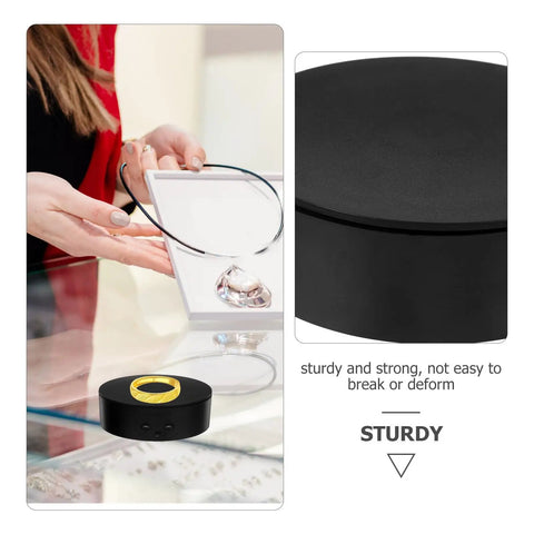 Chic Electric Rotating Display Stand 13CM Silent 360 Turntable Pedestal showcasing jewelry in a shop setting.