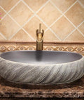 USZWBY Vessel Sinks Bathroom Vessel Sink Washbasin Ceramic Art Countertop Basin round sink with textured surface and faucet