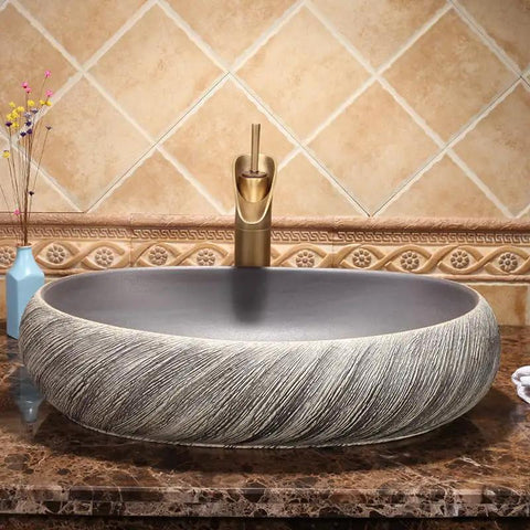 USZWBY Vessel Sinks Bathroom Vessel Sink Washbasin Ceramic Art Countertop Basin round sink with textured surface and faucet