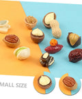 Miniature Resin Nut Ornaments Set For Dollhouse Food Decor displayed on orange and blue surface