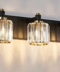 Modern Crystal Vanity Light In Black And Gold That Looks Boss With Dimmable E12 Base, three-light design, K9 crystal shades.