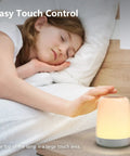 Child sleeping beside Nursery Night Light For Kids With Dimmable Warm White Glow And 5 Color Changing Modes, USB Rechargeable Lamp