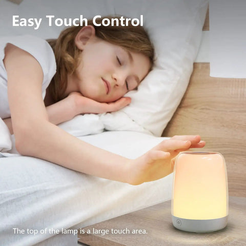 Child sleeping beside Nursery Night Light For Kids With Dimmable Warm White Glow And 5 Color Changing Modes, USB Rechargeable Lamp