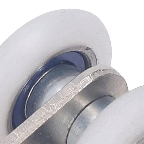 Close-up of white nylon pulley from 10 Pack Sliding Door Trolley Rollers For Strut Channel And Window Tracks