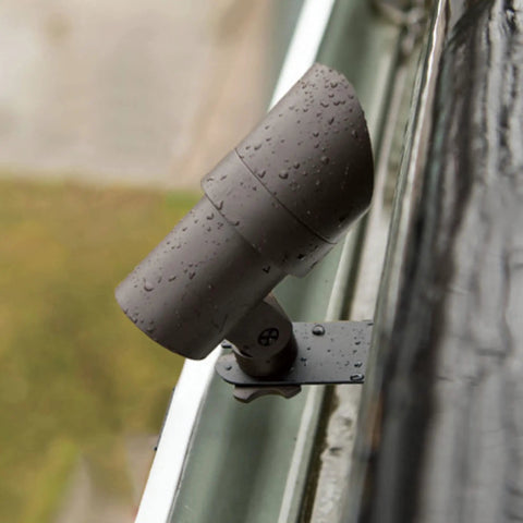 Gutter Mount For Landscape Lighting Fixtures Bronze Or Black Aluminum Heavy Duty Clip attached to gutter in rain