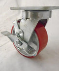 Heavy Duty 5 Inch Swivel Caster Kingpinless Design With Top Lock Brake Smooth Riding Polyurethane Wheel On Steel Core 1100 Lbs Capacity close-up view.