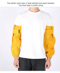 Heavy Duty Cowhide Welding Sleeves Pair Self Adhesive Arm Guards in golden yellow, heat-resistant with cotton lining, worn by a person.