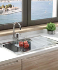Stylish kitchen sink with view of bay through window, featuring Sink Top Air Switch Kit For Garbage Disposal Brushed Nickel Stainless Steel Button Short 2.5 Inch Size for Thin Countertops Dead Simple Install Safe Power Operation.