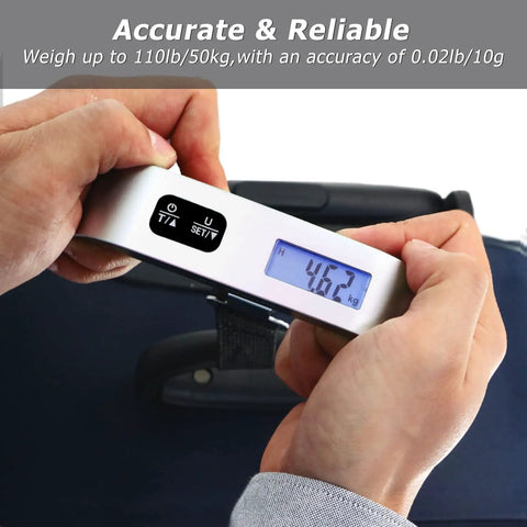 Hands holding Hassle Free Travel Luggage Scale Portable Digital Hanging Baggage Scale With 110 Lb Capacity Lightweight Suitcase Weight Scale Battery Included Silver.