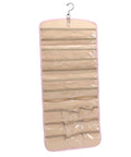 Slick Double Sided Hanging Jewelry Organizer With Foldable Design And Ample Pockets For Rings Earrings Watches, opened with clear compartments.