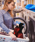 Person holding BBQ Gloves Heat Resistant Up To 1472 Fahrenheit Silicone Non Slip Long Kitchen Gloves for laundry