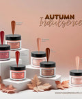 Autumn Indulgence Acrylic Nail Powder Set 6 Pc 1.5 Oz each displayed on pedestals with fall leaves and color samples