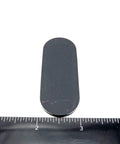 Two And A Half Inch Oval Silicone Rubber Bumper Feet One Eighth Inch Thick With Adhesive Backing next to ruler measurement