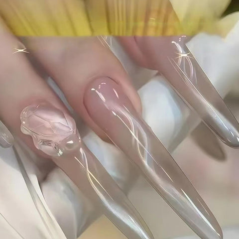 Close-up of glossy, sculpted nails with 3D detail, highlighting manicure finish not related to Auto Weld Nails Set 600 Pieces